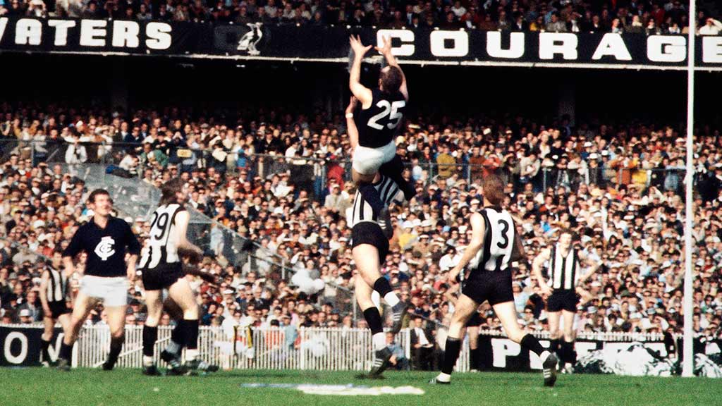 Jesaulenko-Grand-Final-MCG-1970Rennie-Ellis_v1_300.jpg Jezza's famous grab isn't the only reason the 1970 decider is etched in football folklore. Picture: Rennie Ellis - AFL,Collingwood Magpies,Carlton Blues,Alex Jesaulenko,Rivals,Syd Jackson,Len Thompson,Des Tuddenham,Ted Hopkins,Ron Barassi,Grand Final